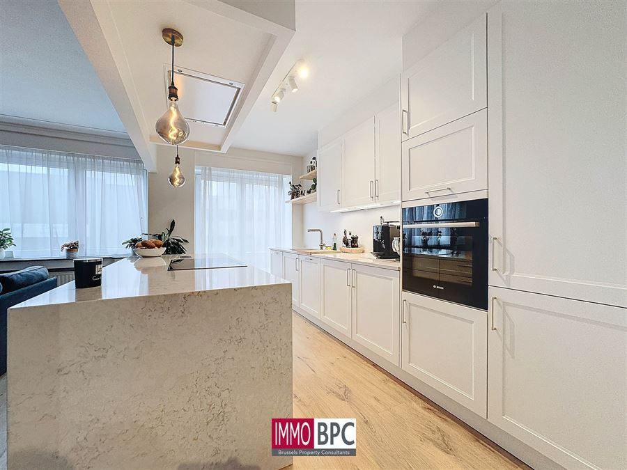 Volledig gereonveerd Appartement met 2 slk. foto 13