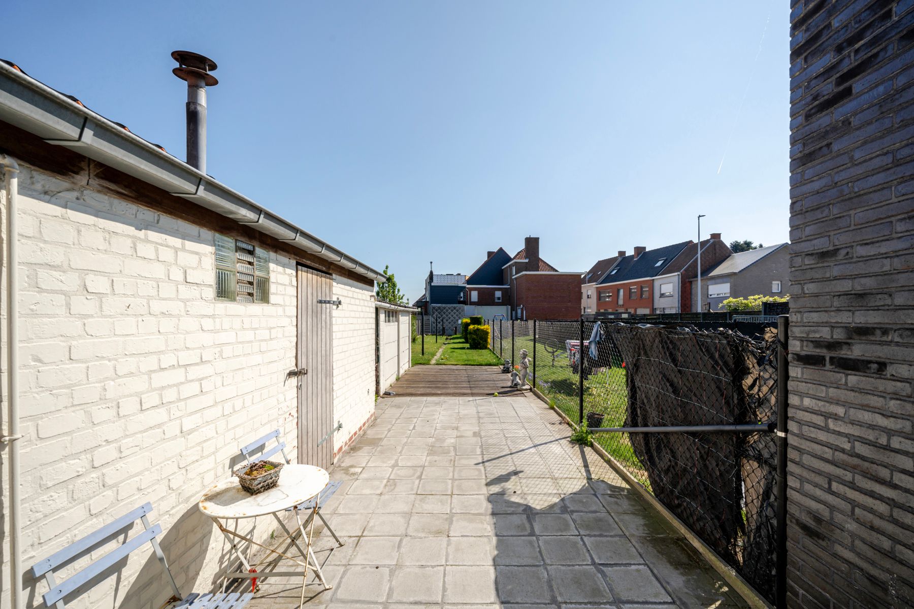 Woning met tuin en doorgang achteraan foto 18