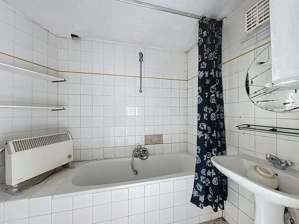 Te renoveren huis te koop in centrum Wuustwezel foto 9