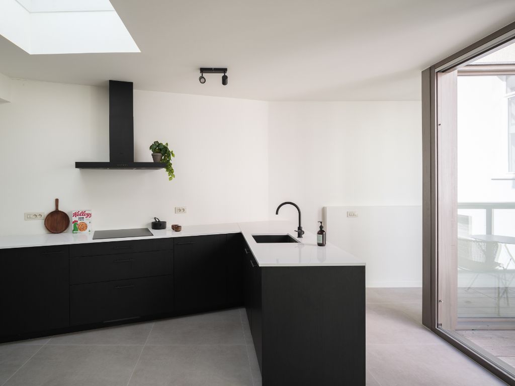 Luxueus appartement met groot volume en terras op toplocatie aan de Sint-Michielskerk foto 12