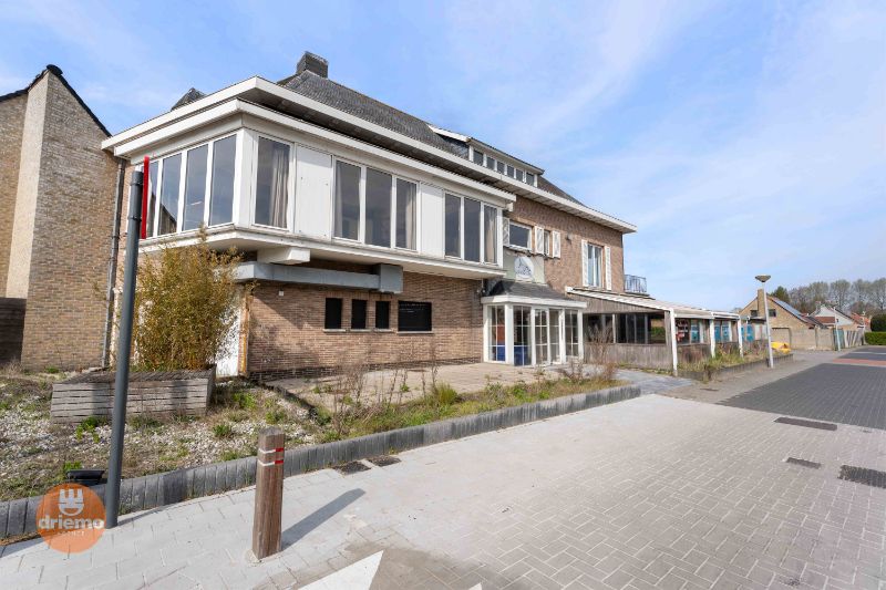 Ruime woning met handelspand foto 14