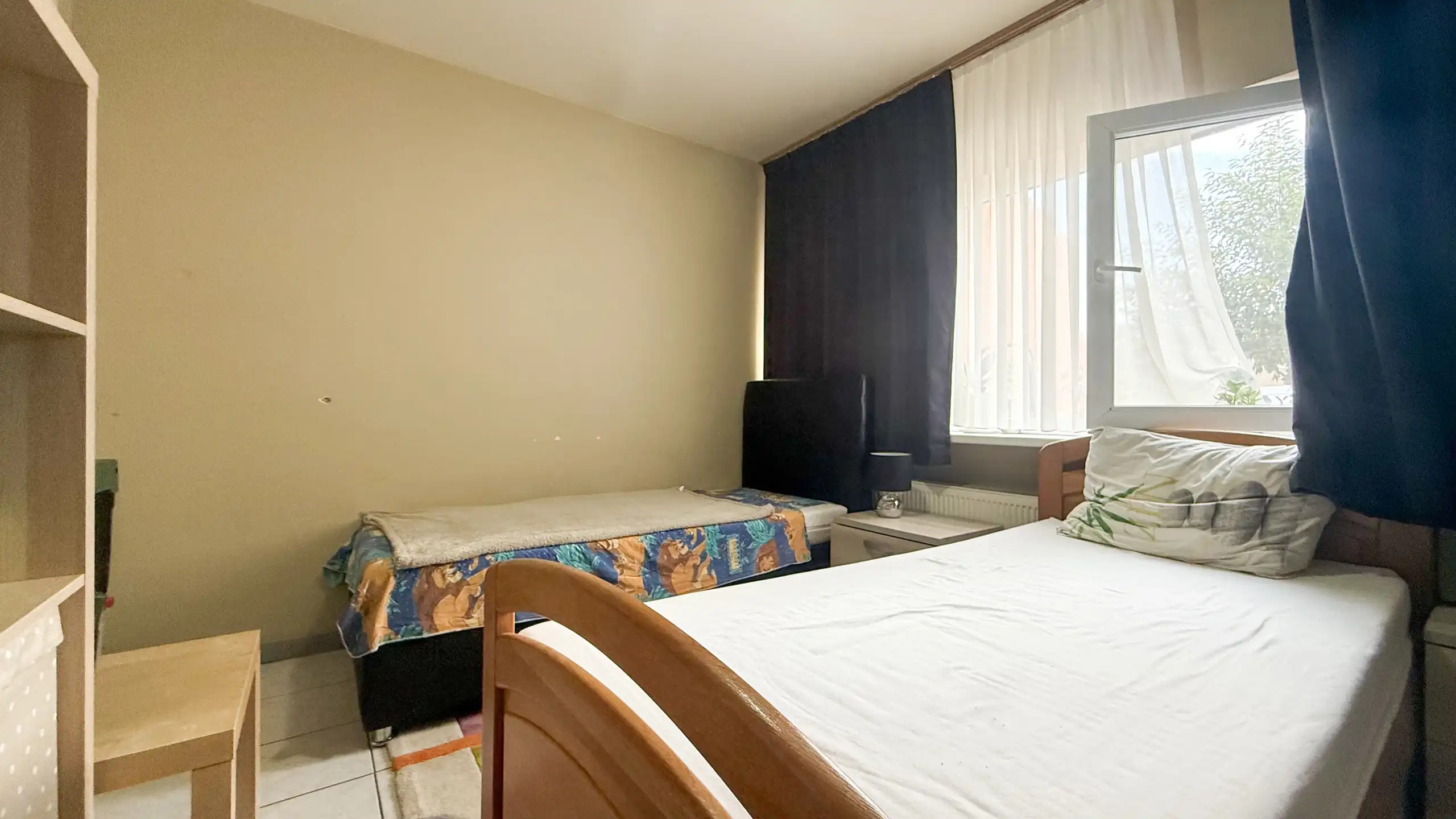 Gelijkvloers appartement met 2 slpk en privé buitenruimte! foto 11