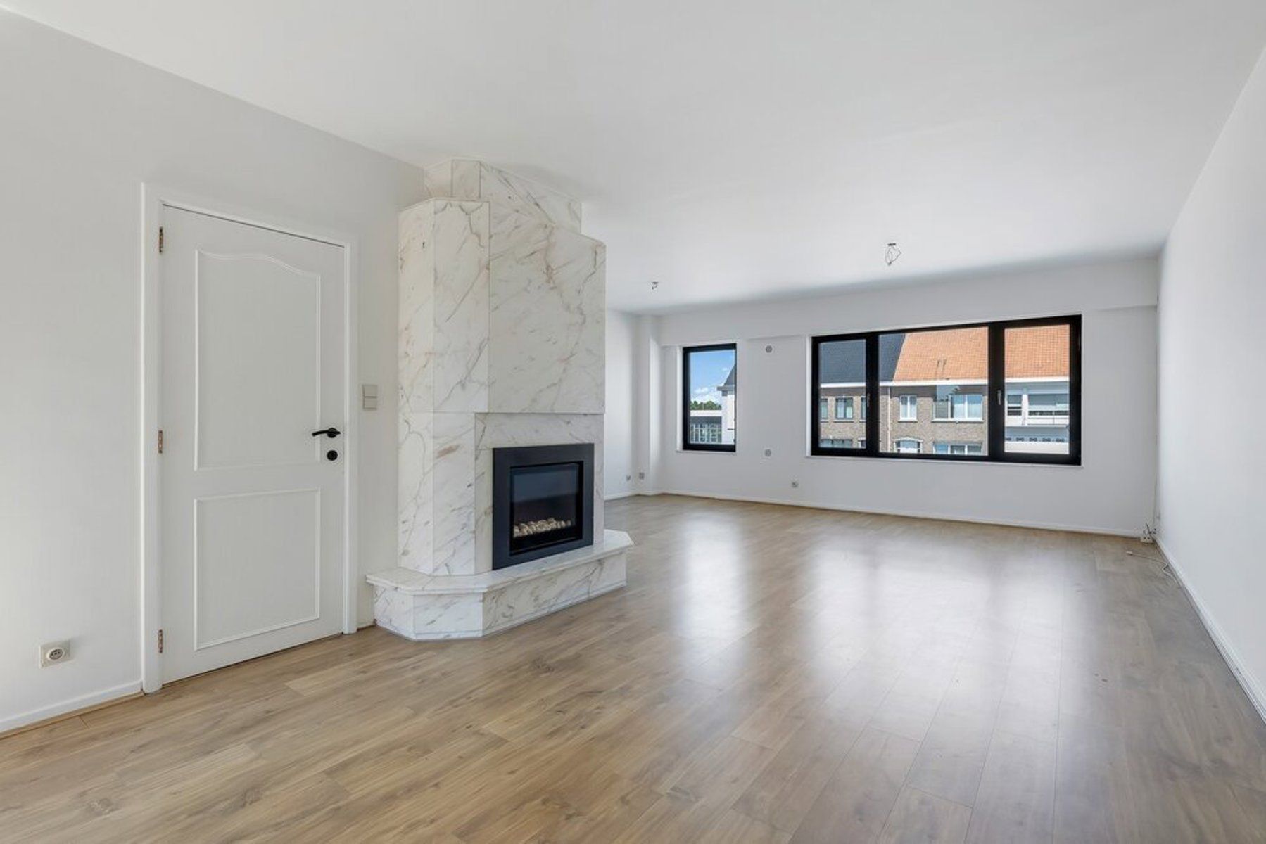Handelspand met bouwgrond, duplex en parking te koop foto 11
