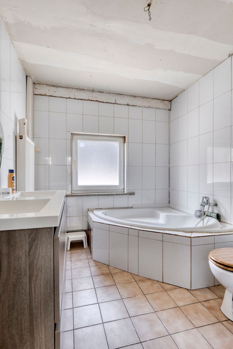 Half-open bebouwing met 3 slaapkamers en tuin! foto 9