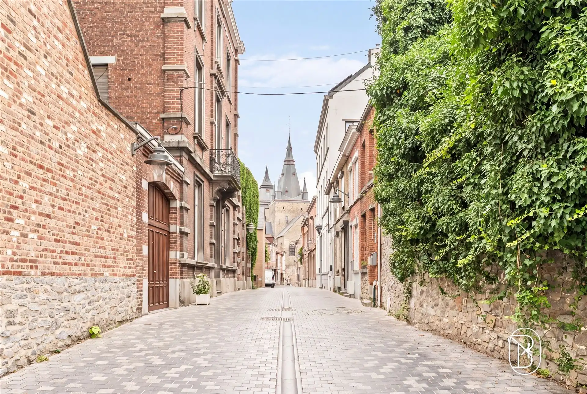Opbrengsteigendom: handelsruimte en 2 appartementen foto 2