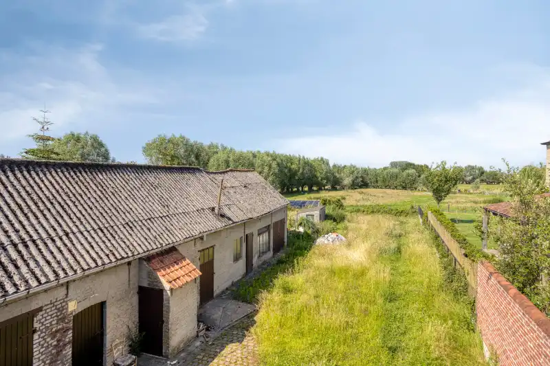 Karaktervolle woning met voormalige schuur en adembenemend uitzicht op de velden foto 13