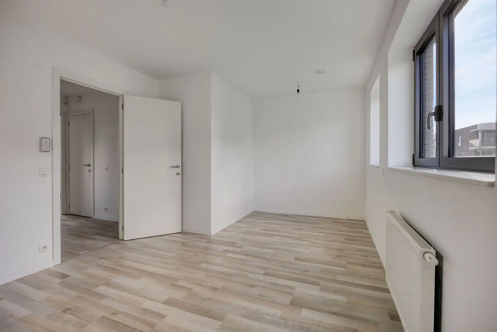 Recente 3-gevelwoning met 3 slaapkamers, tuin en garage foto 19