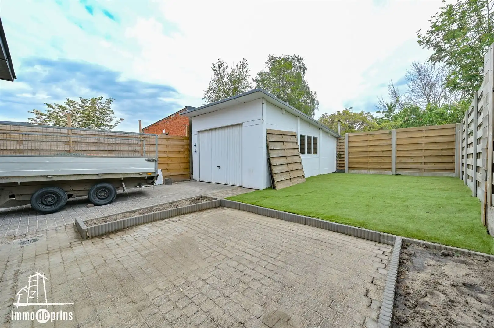 Halfopen gezinswoning met tuin en garage foto 21