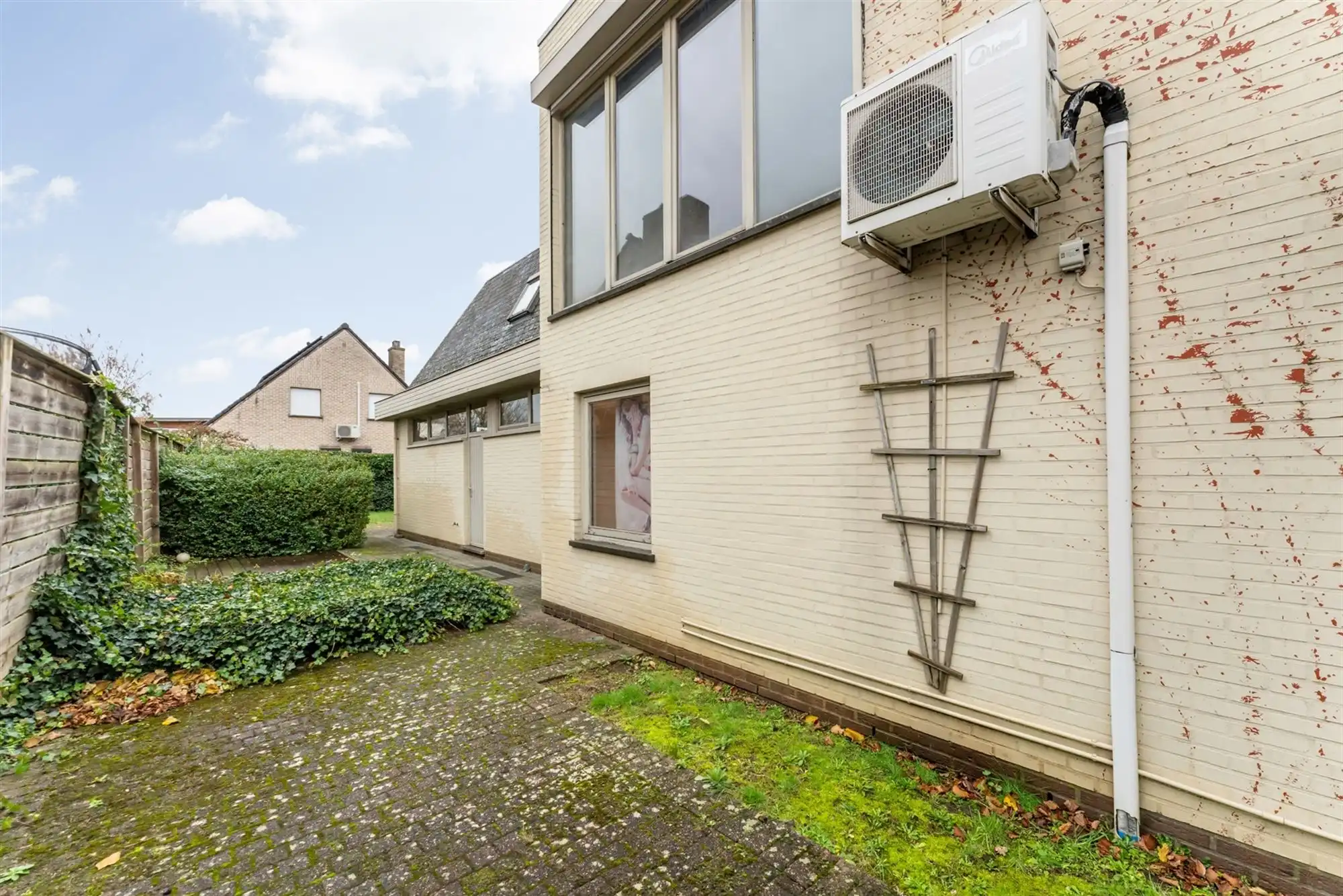 HANDELSPAND MET GOEDE VISIBILITEIT EN RUIME PARKING MET BOVENLIGGEND APPARTEMENT IN HEUSDEN-ZOLDER foto 26