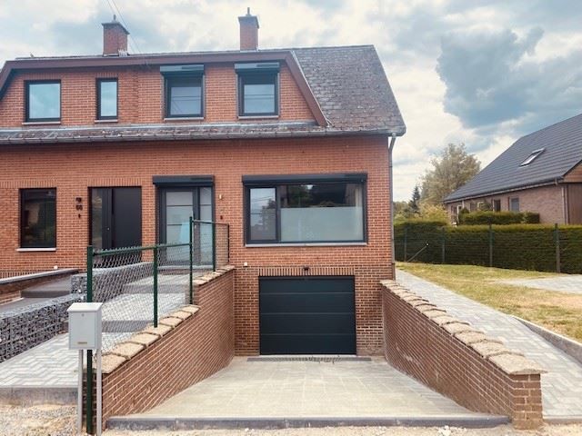 Gezellige halfopen woning met grote tuin foto 17