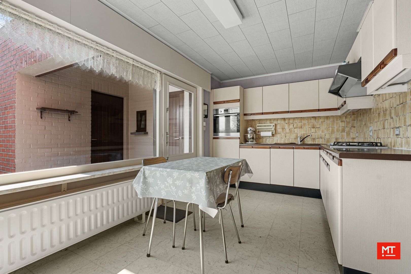 Kloeke, halfopen woning met 3 slaapkamers, tuin en garage in een rustige straat te Geluwe foto 7