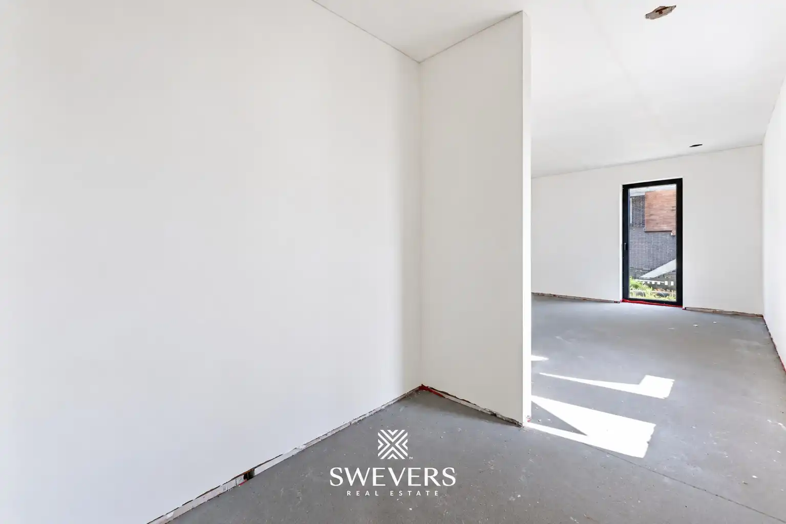 Gelijkvloers 3-slaapkamer appartement met eigen inkom en 2 terrassen in Houthalen foto 3