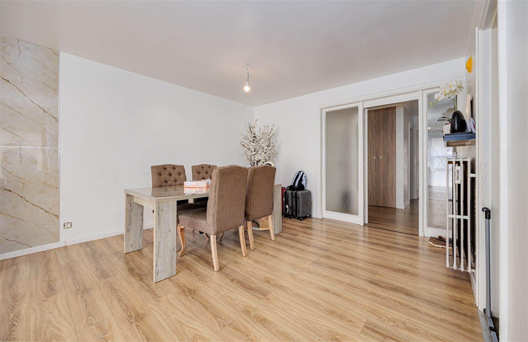 Vergund betonnen opbrengsteigendom met 3 appartementen + garagebox foto 4