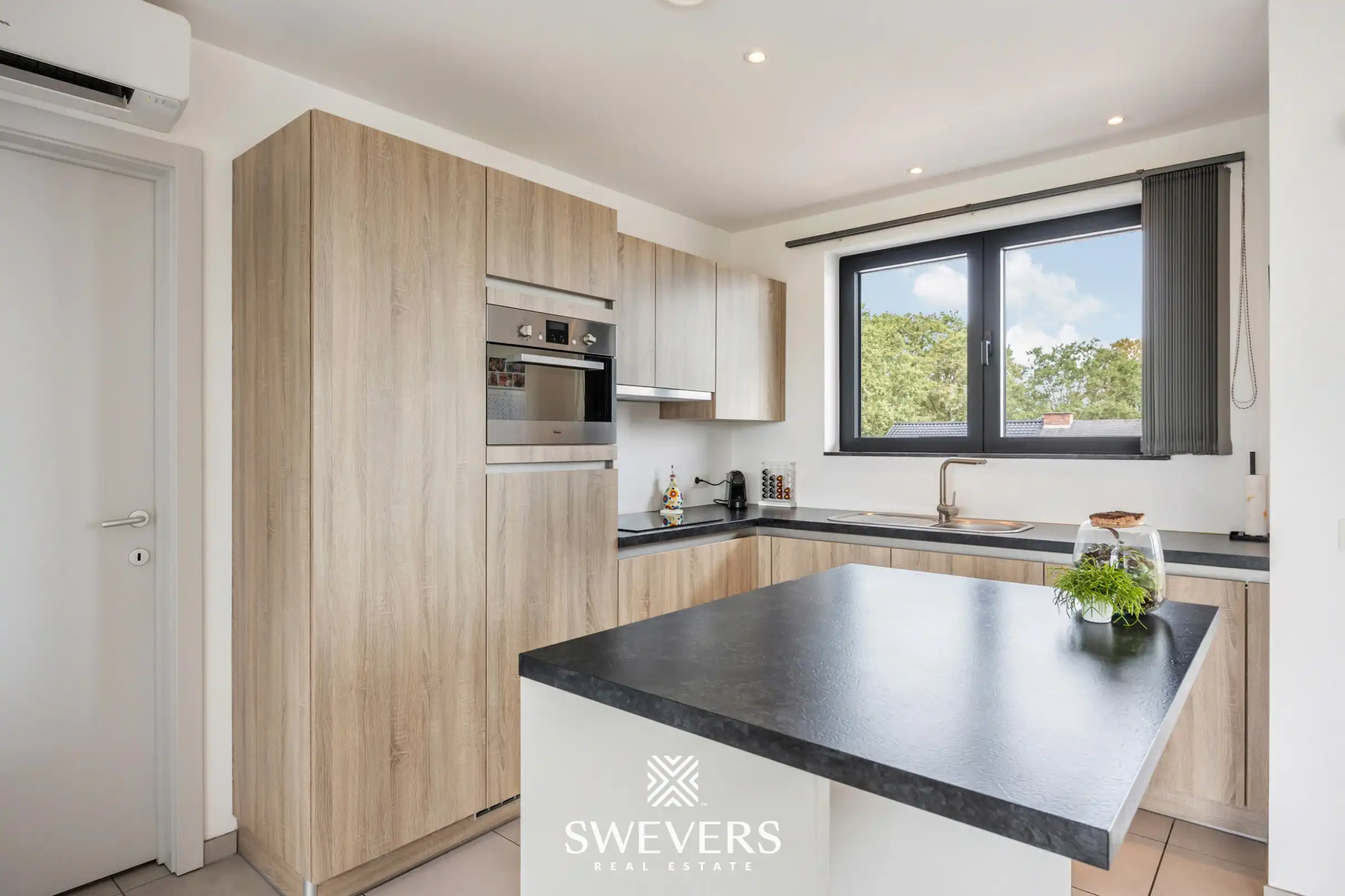 Modern appartement met 2 slaapkamers en 2 terrassen op een gunstige locatie in Houthalen foto 9