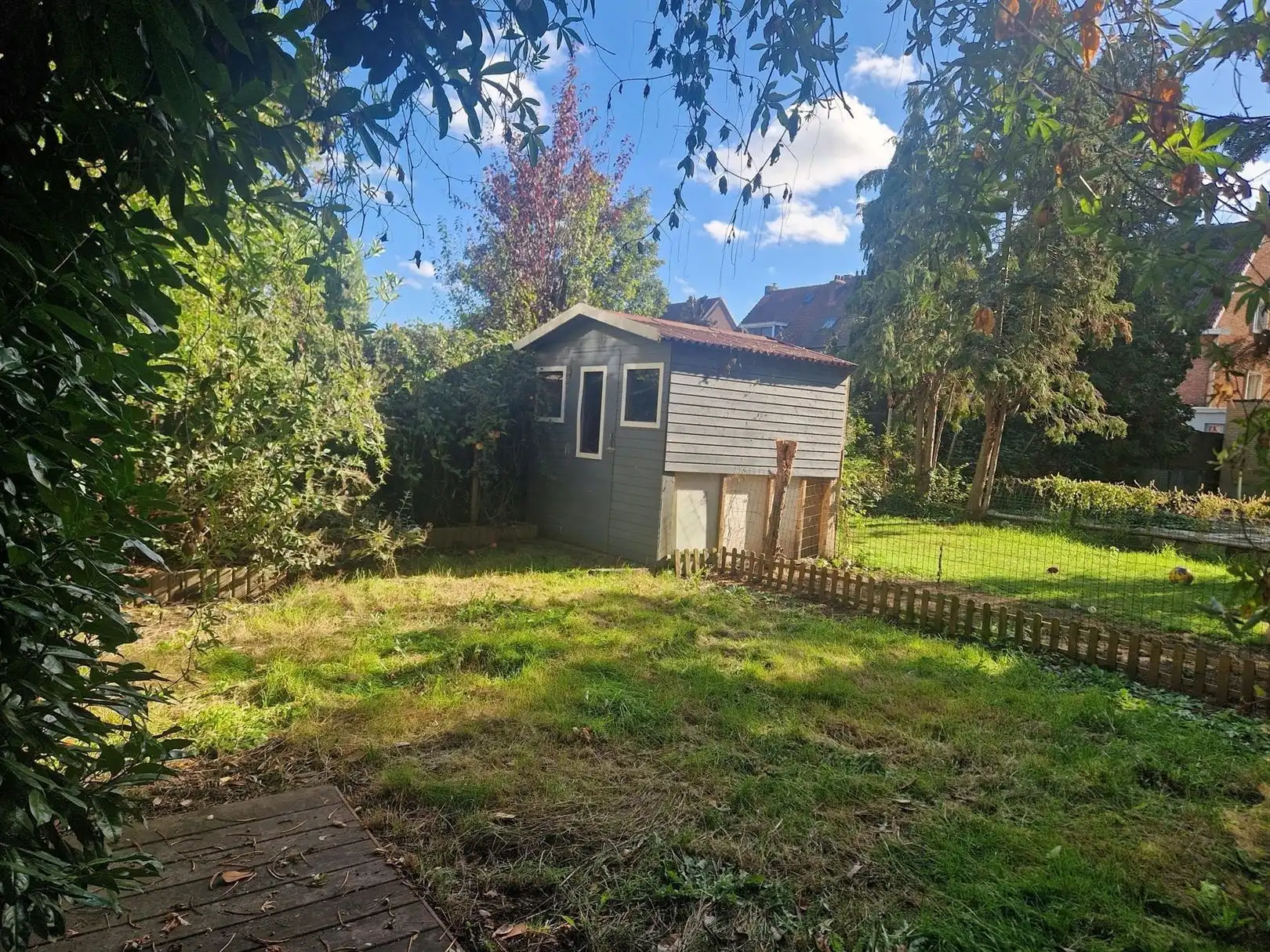 Gelijkvloers appartement met grote privatieve tuin. foto 10