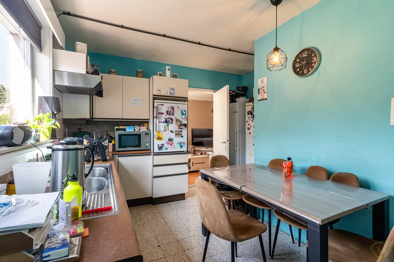 Te renoveren gezinswoning met grote tuin in het centrum van Bassevelde foto 8