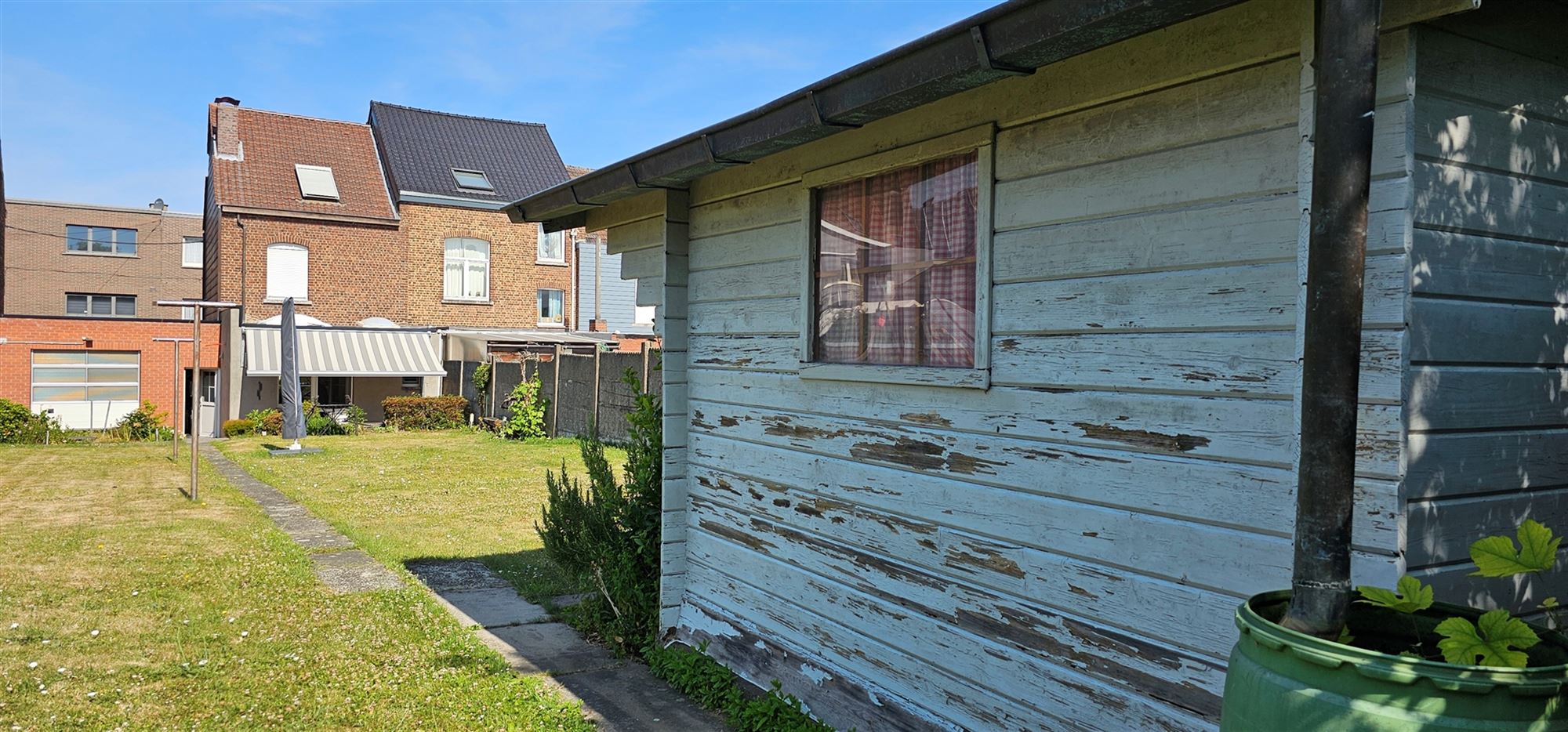 VERZORGDE WONING MET GROTE GARAGE & BOUWGROND foto 15
