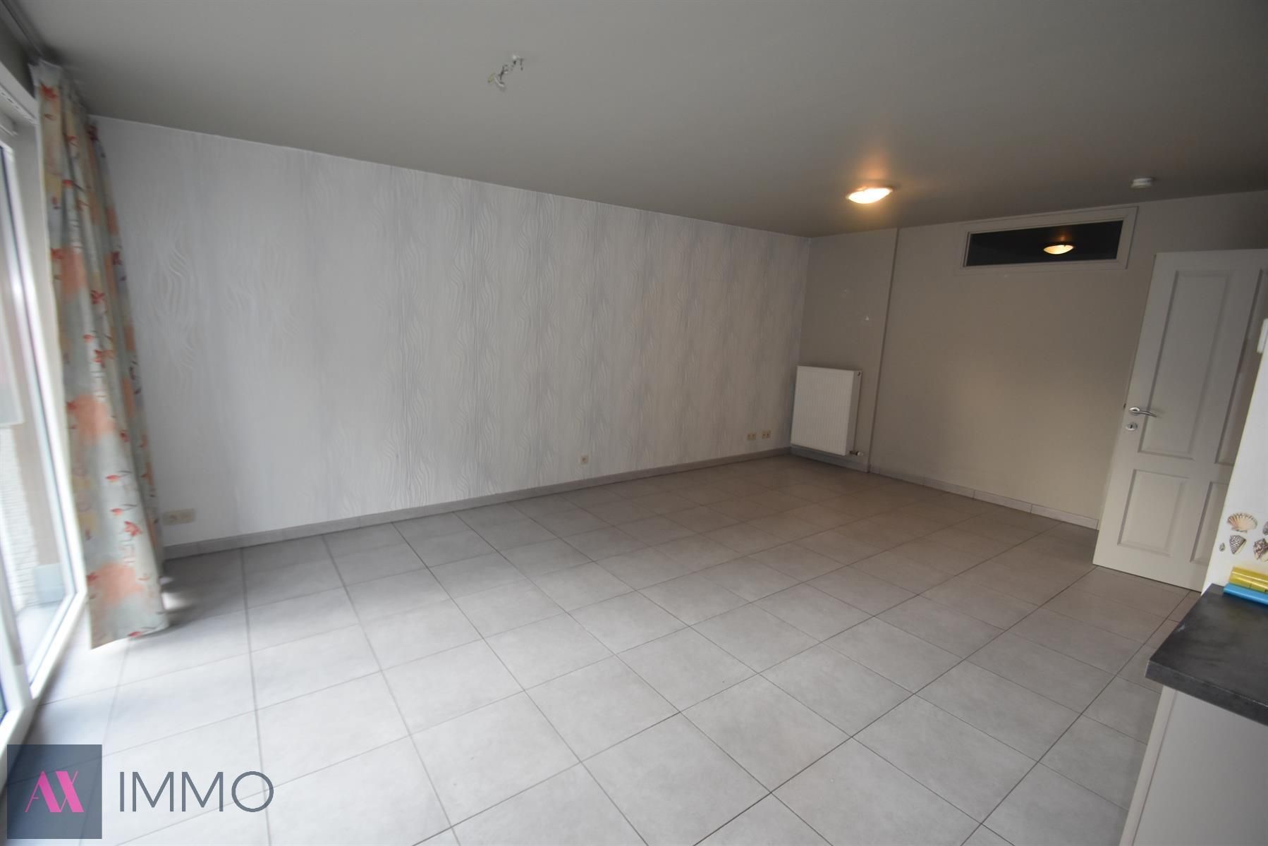 Instapklaar 1 slpk-appartement nabij winkels en openbaar vervoer! foto 2