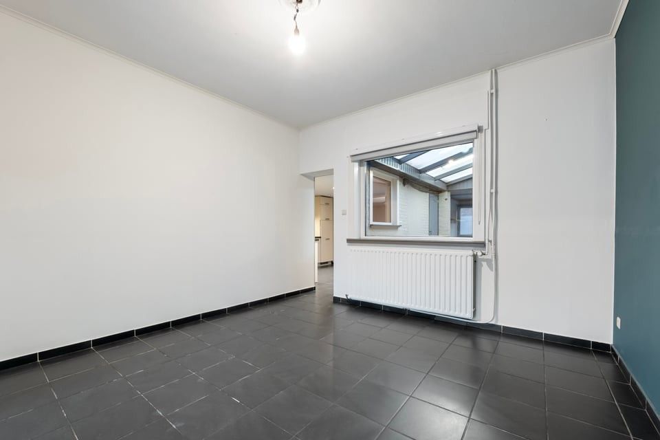 RUIME, INSTAPKLARE WONING MET 4 SLAAPKAMERS EN EEN ZONNIGE TUIN TE HEERS foto 6