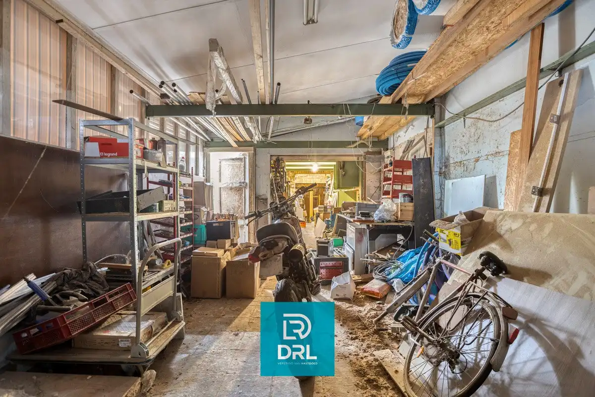 Af te werken woning met grote werkplaats/loods te Sint-Kruis. foto 16