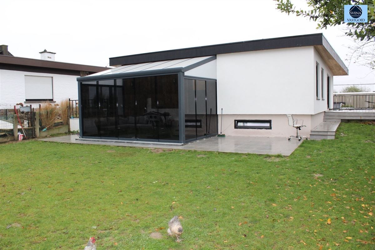 WONING MET HANDELSRUIMTE EN 3 SLAAPKAMERS foto 2