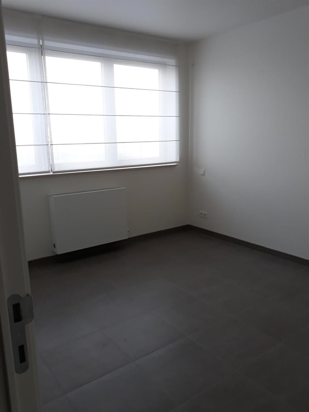 Instapklaar gelijkvloers appartement in het centrum van Diepenbeek foto 7