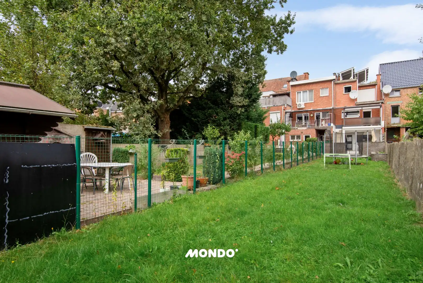 Ruime woning met 2 slaapkamers, garage, twee terrassen en tuin  foto 16