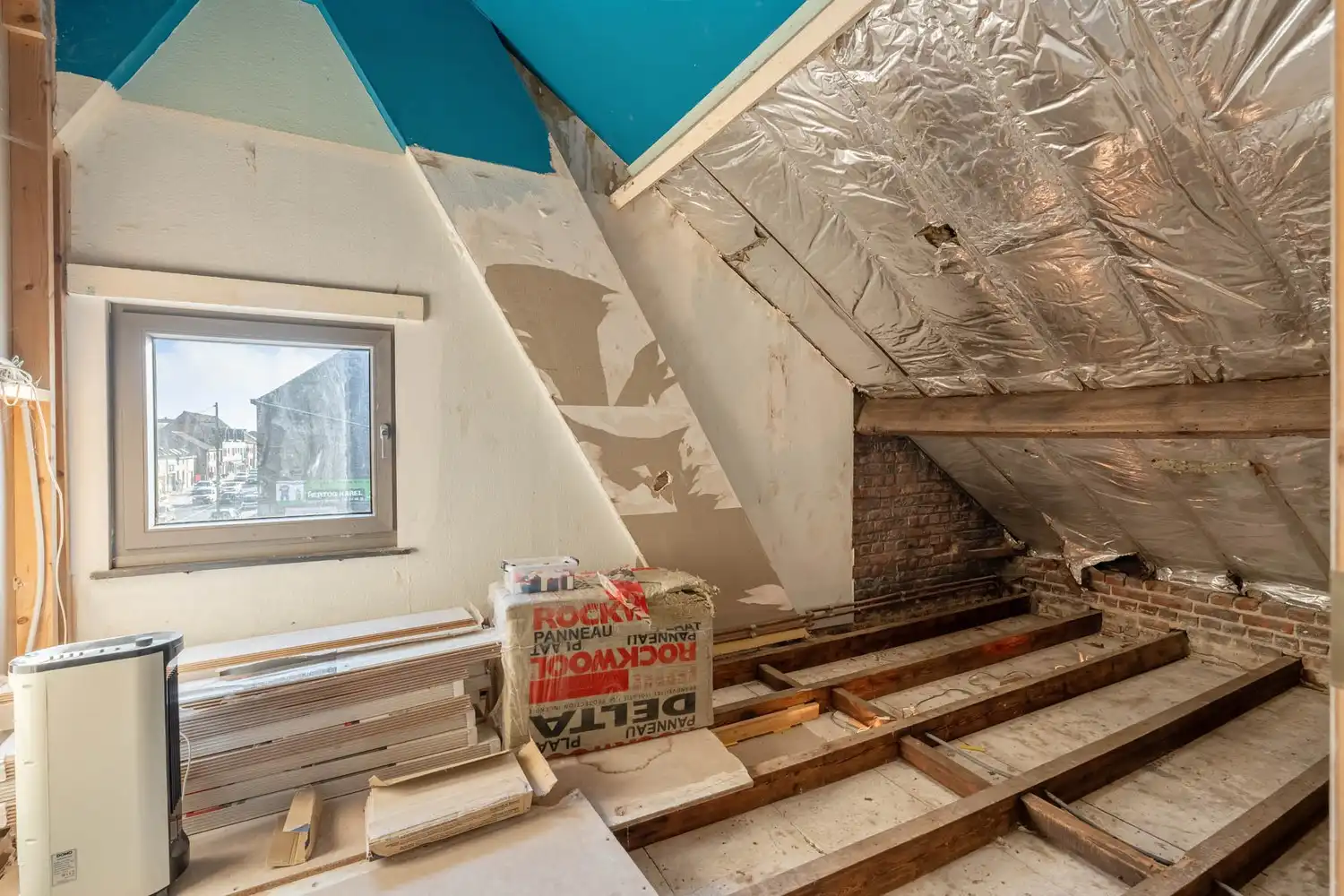 Goed gelegen halfopen bebouwing met 3 slaapkamers en een tuin met een poortje naar de straat te Wilsele! foto 22