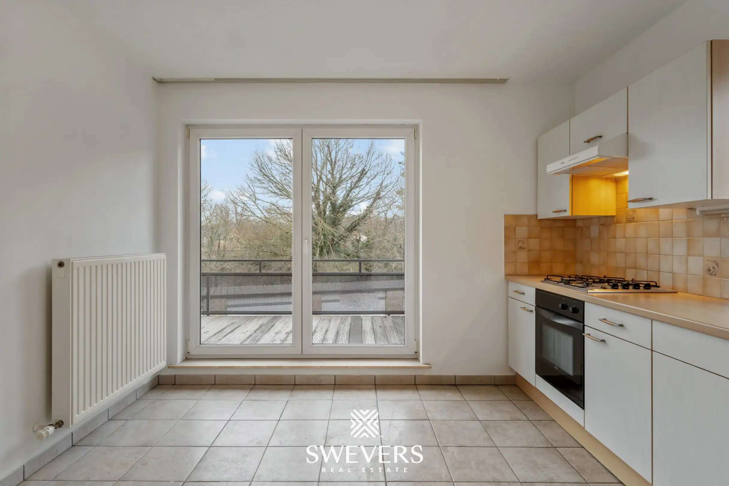 Ruim duplex appartement met 2 slaapkamers, terras en garage in Heusden-Zolder foto 6