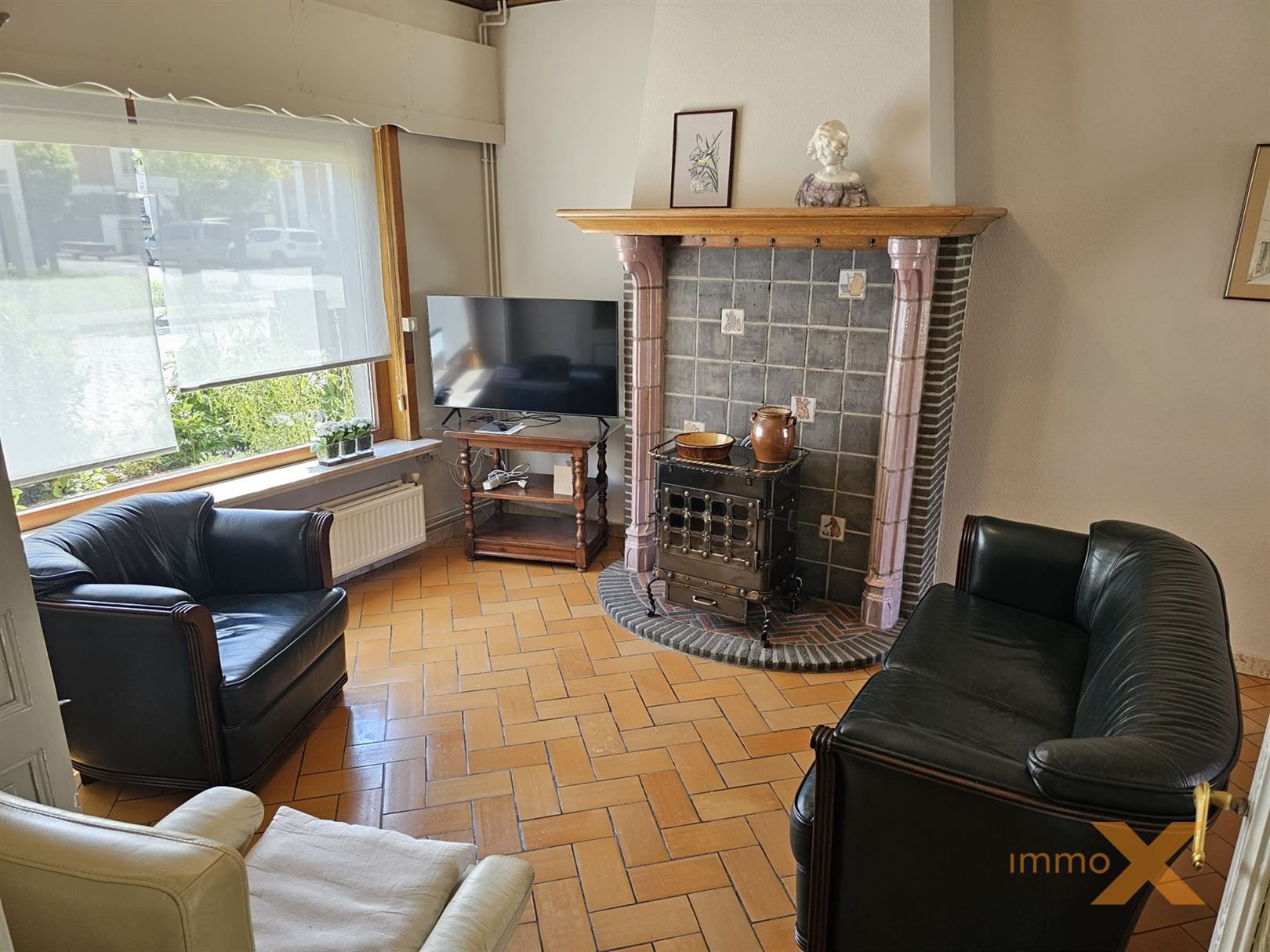 CHARMANTE WONING MET TUIN EN GARAGE foto 11
