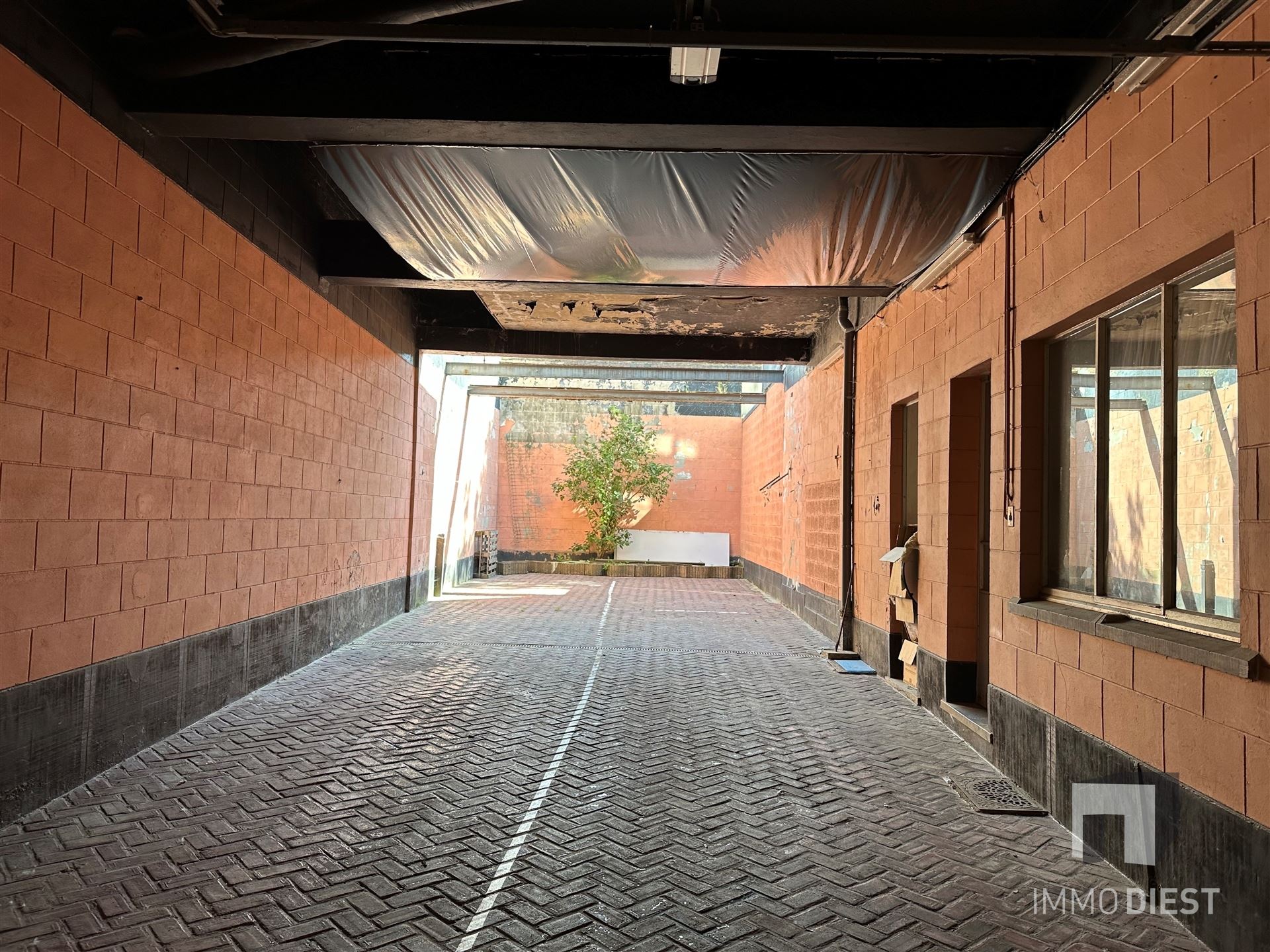 Building centrum Diest - handelspand, 2 appartementen en parking foto 20