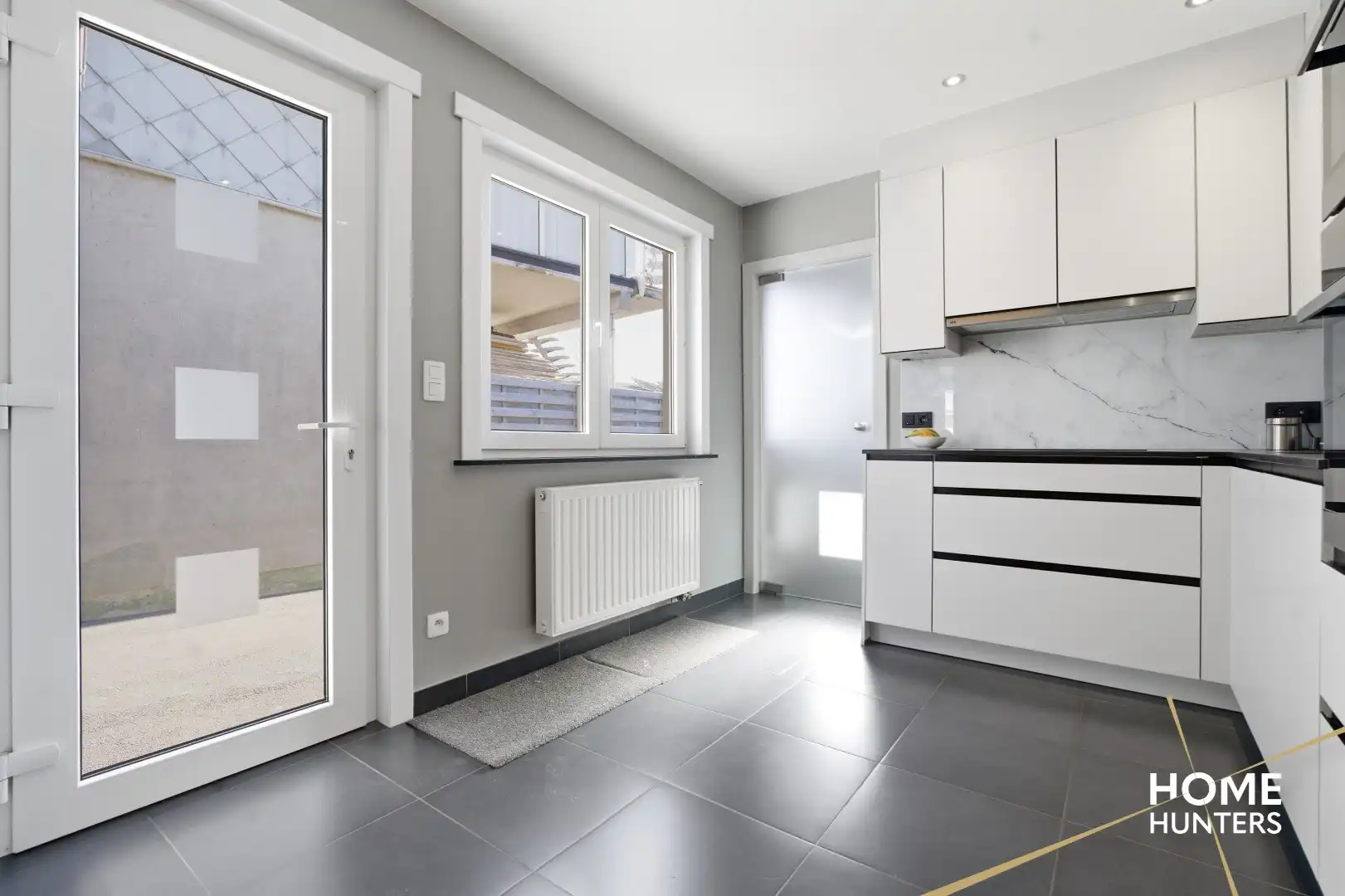 Volledig gerenoveerde gezinswoning met 4 slaapkamers en zuidgerichte tuin! foto 6