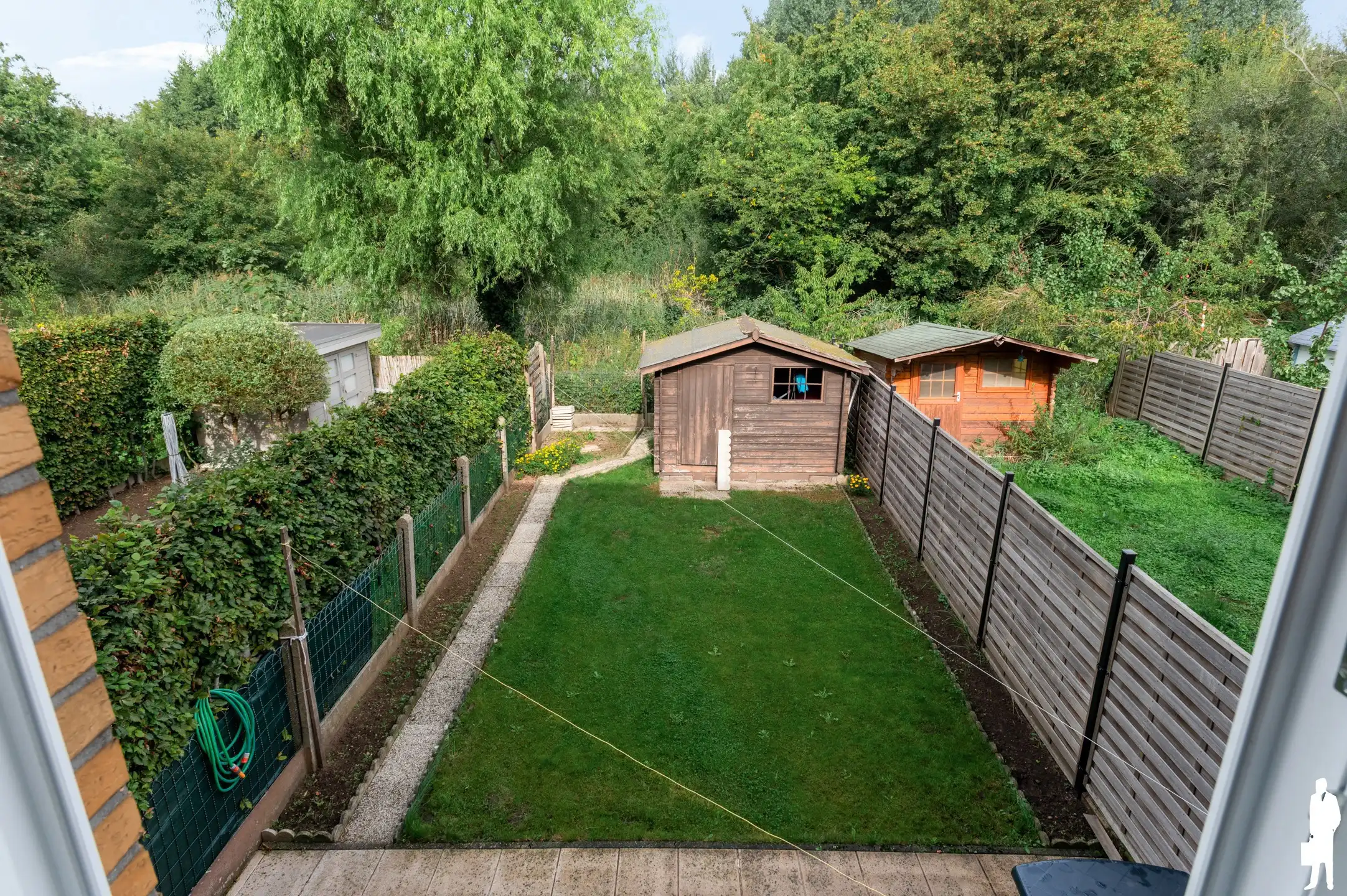 Ruime bel-etagewoning met 4 slaapkamers, garage en tuin foto 12