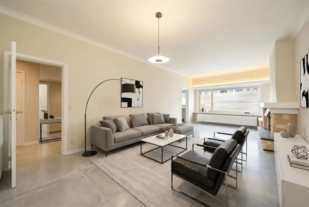 Instapklaar gelijkvloersappartement met stadskoer foto {{pictureIndex}}