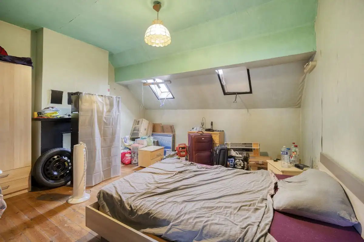 Opbrengsteigendom met renovatiepotentieel in Anderlecht foto 39