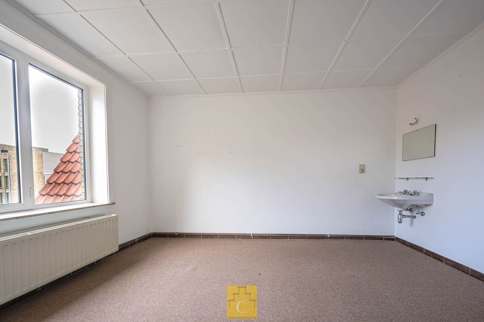 handelshuis op toplocatie vlakbij de Markt, dubbele 17e eeuwse trapgevel, knappe winkel/kantoor, 2 cosy appartementen met 2 à 3 slaapkamers, terras foto 20