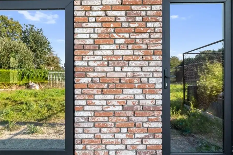 VOLLEDIG AFGEWERKTE HALFOPEN NIEUWBOUWWONING IN PASTORIJSTIJL IN WAASMONT foto 6