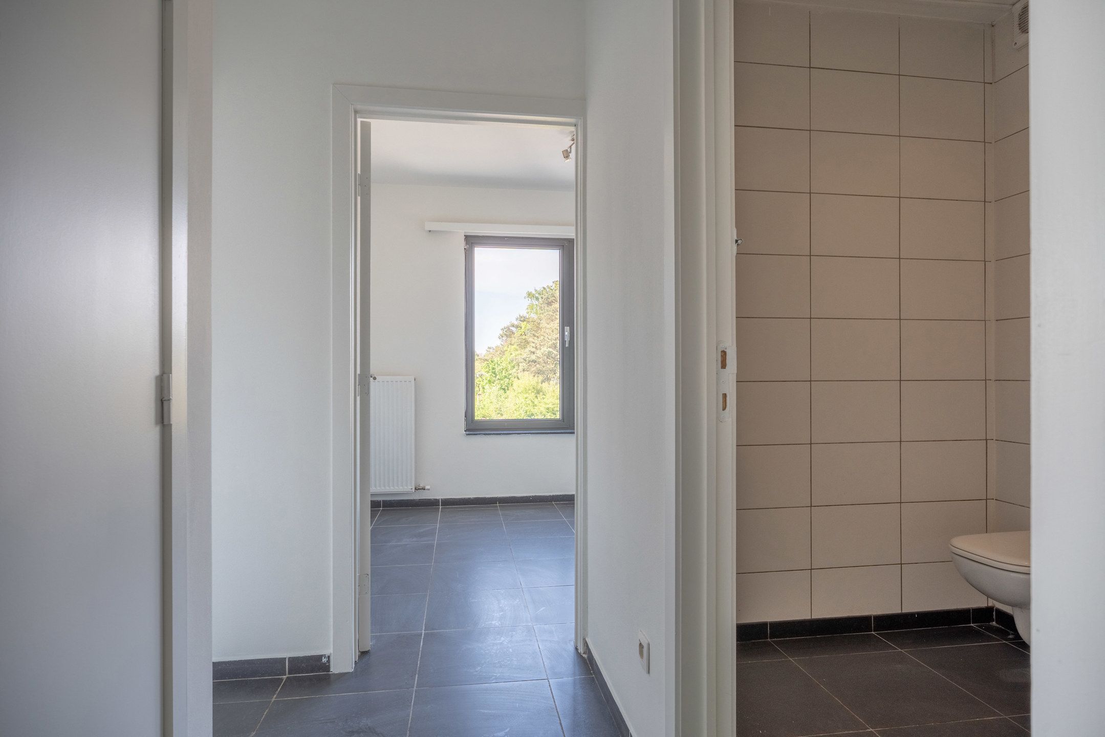Lichtrijk appartement met 3 slpk's te centrum Vosselaar foto 11