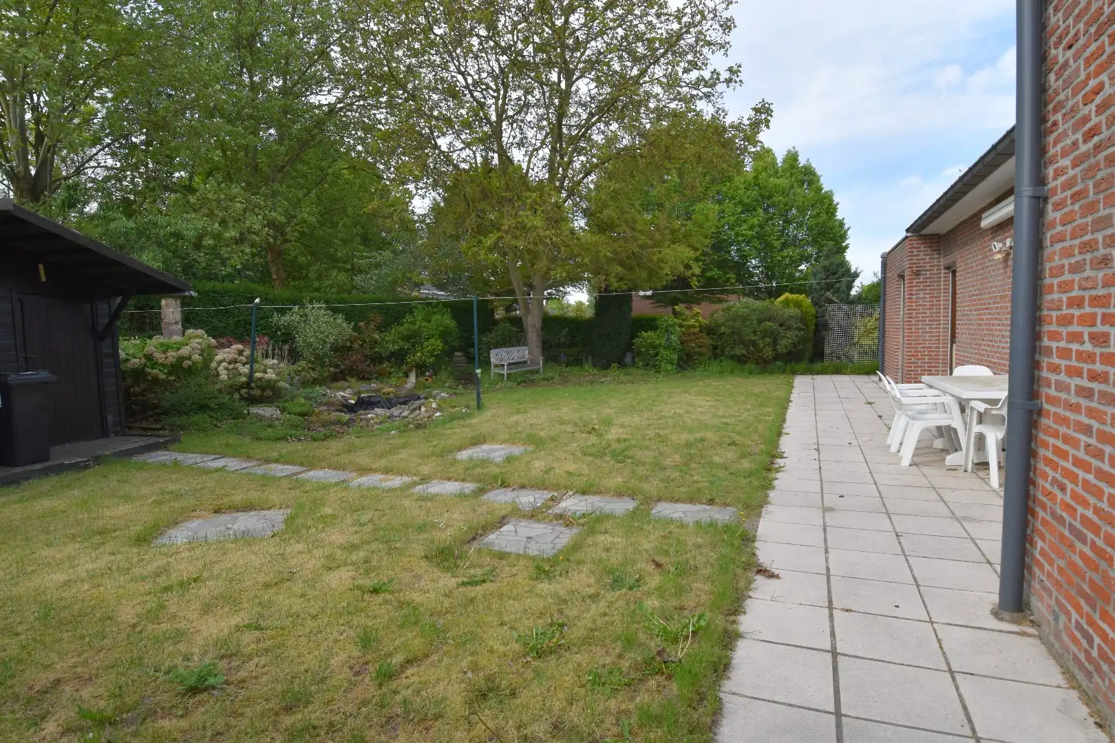 Ruime half open gelijkvloerse woning met tuin, garage en 3 slaapkamers in Harelbeke foto 14