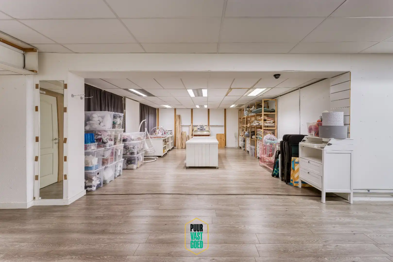 Riant appartement en studio boven grote handelsruimte  foto 7