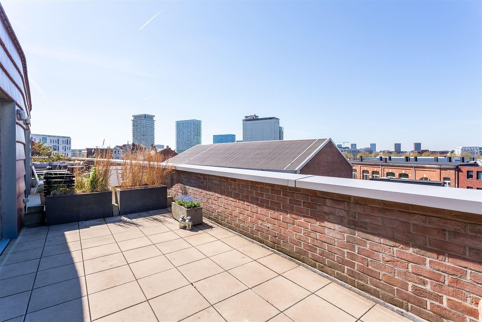 Lichtrijke duplexpenthouse met twee terrassen foto {{pictureIndex}}