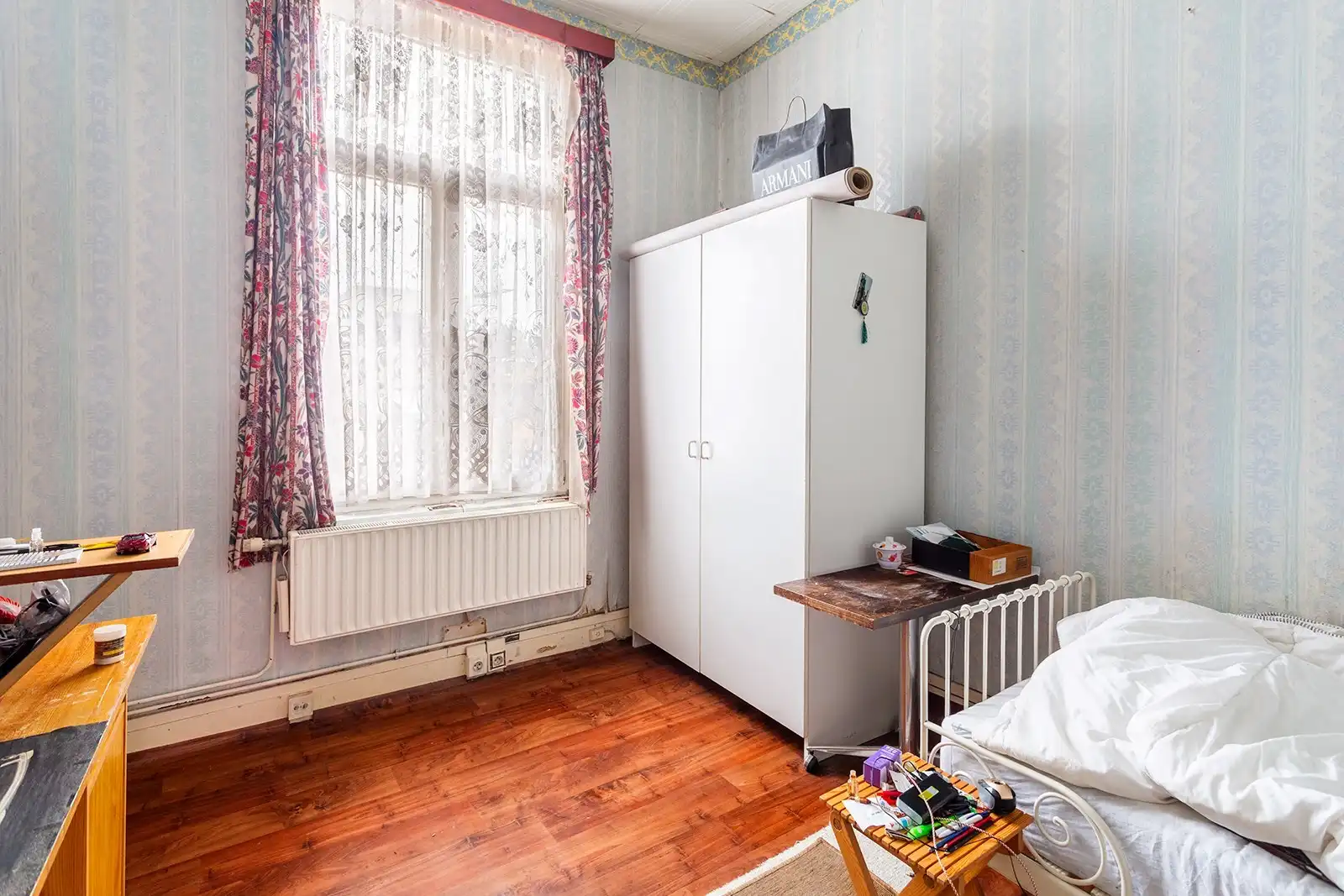 Op te frissen ruime woning met 7 slpk,3 badkamers,terras en garage foto 18