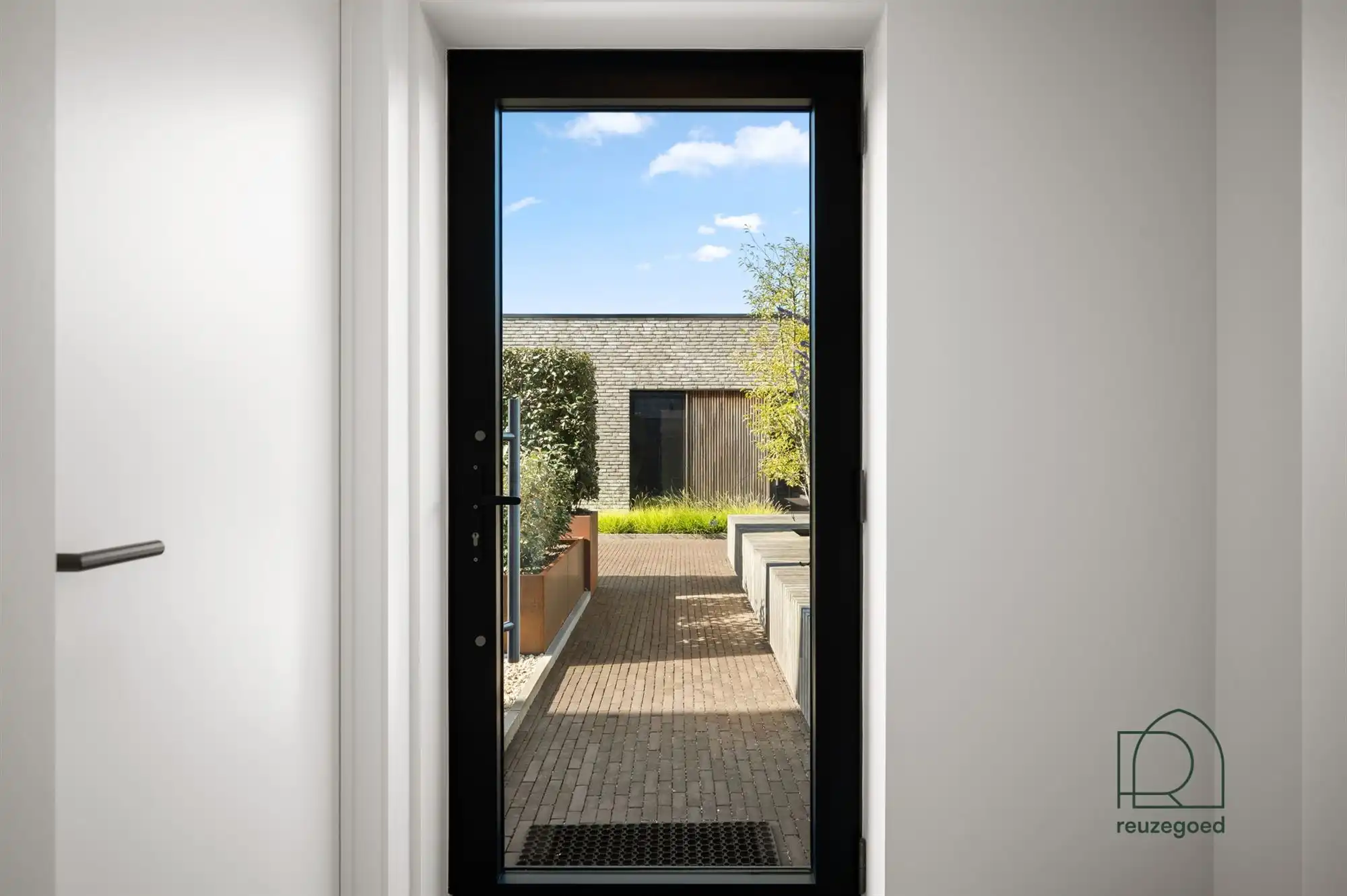 Uniek duplexappartement (3 slpk) met huisgevoel, groene daktuin en zicht op de velden in Kortessem foto 3