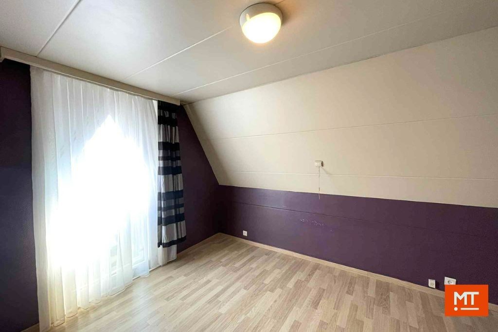 Veelzijdig gebouw bestaande uit handelsruimte, woning en appartement in het centrum van Wervik foto 26