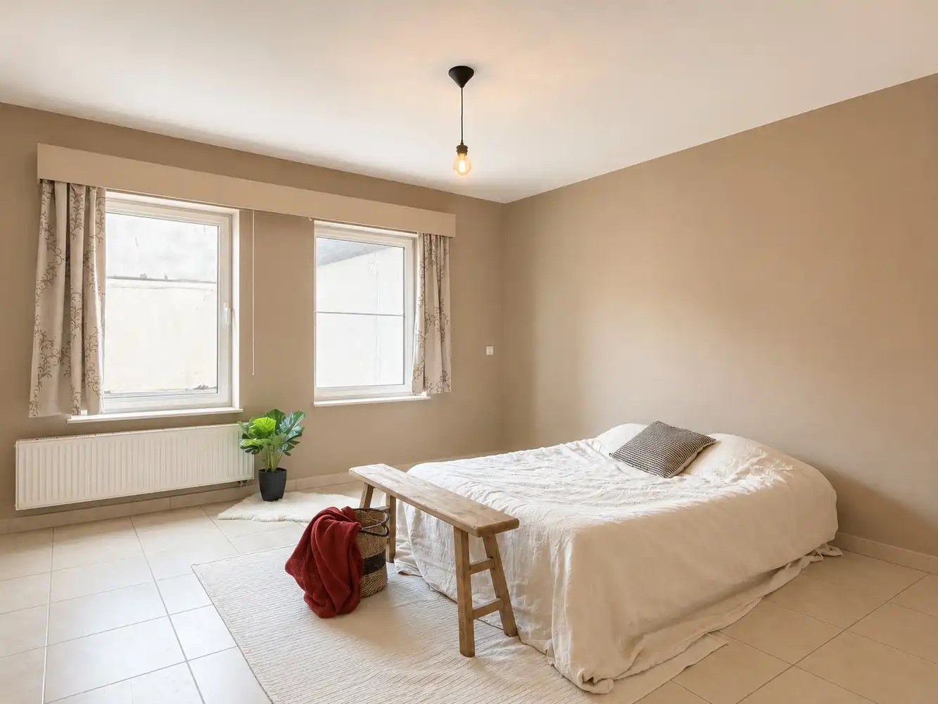 Instapklaar en energiezuinig ruim twee slaapkamer appartement in het centrum van Eke foto 7