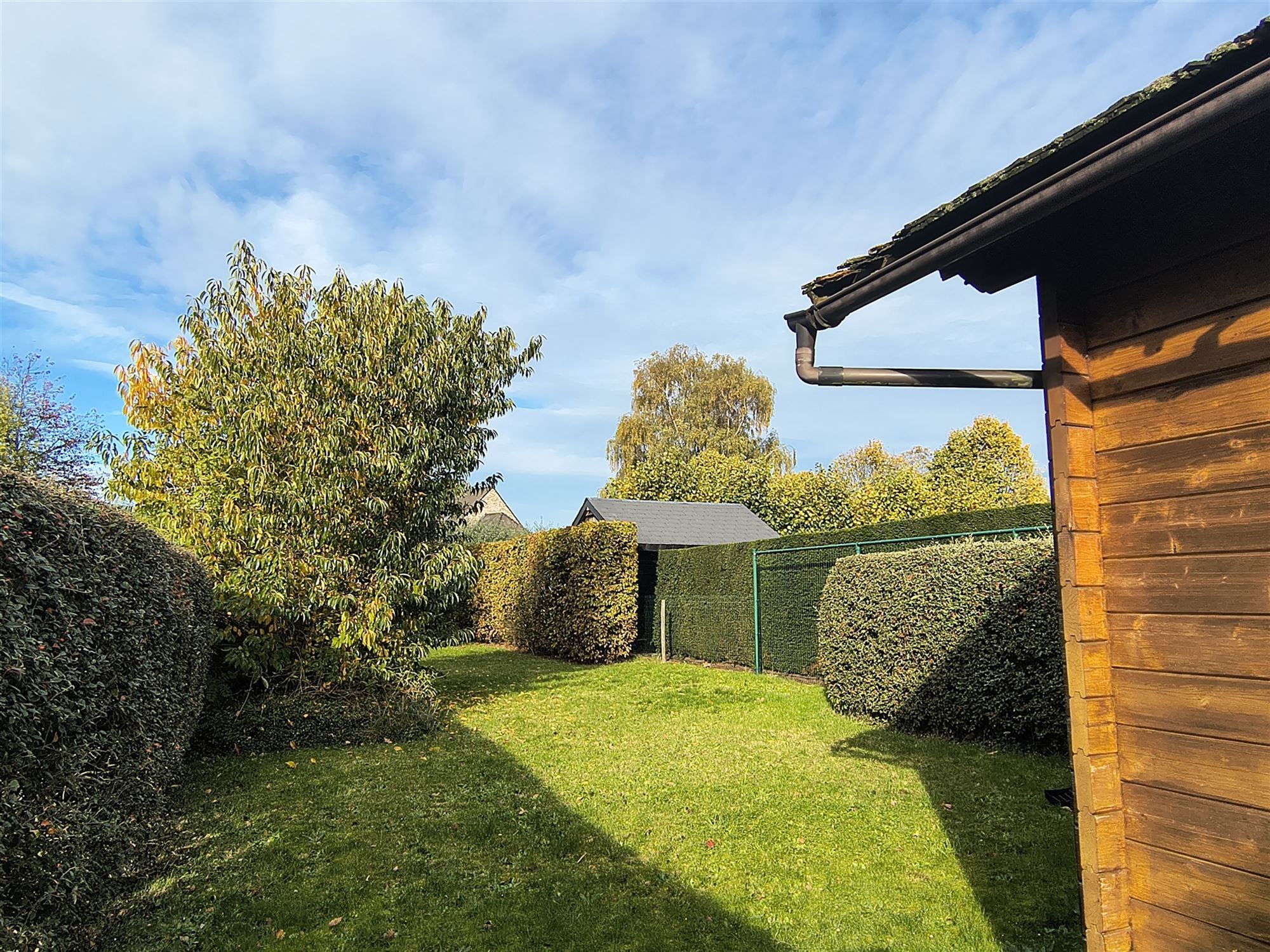 Rustig gelegen woning met 3 slaapkamers, garage en aangename tuin foto 16
