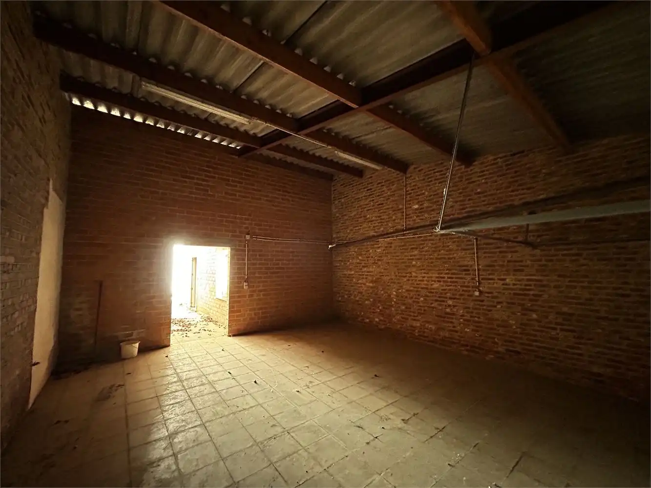 Te renoveren handelshuis met woonst foto 24