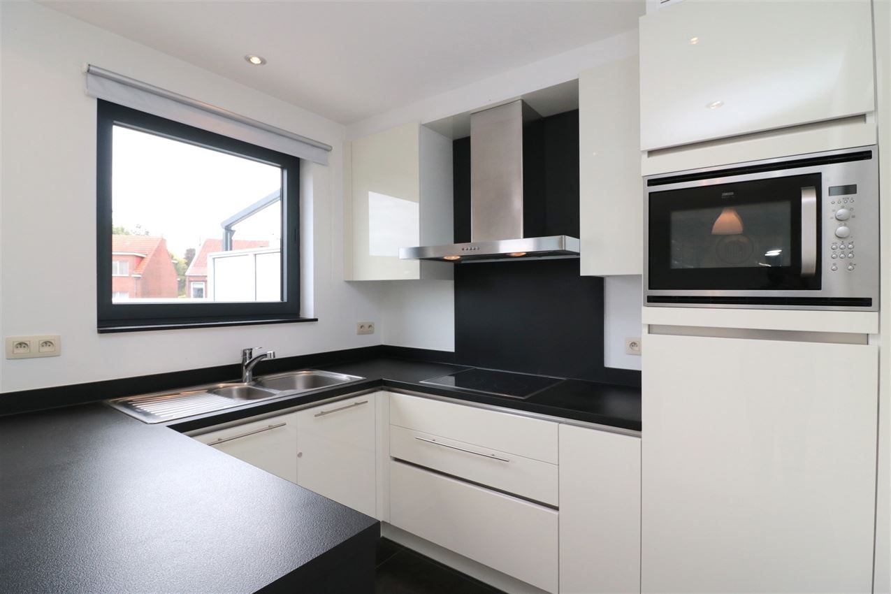 Triplex met groot zuidterras, garage, nabij E314 foto 17