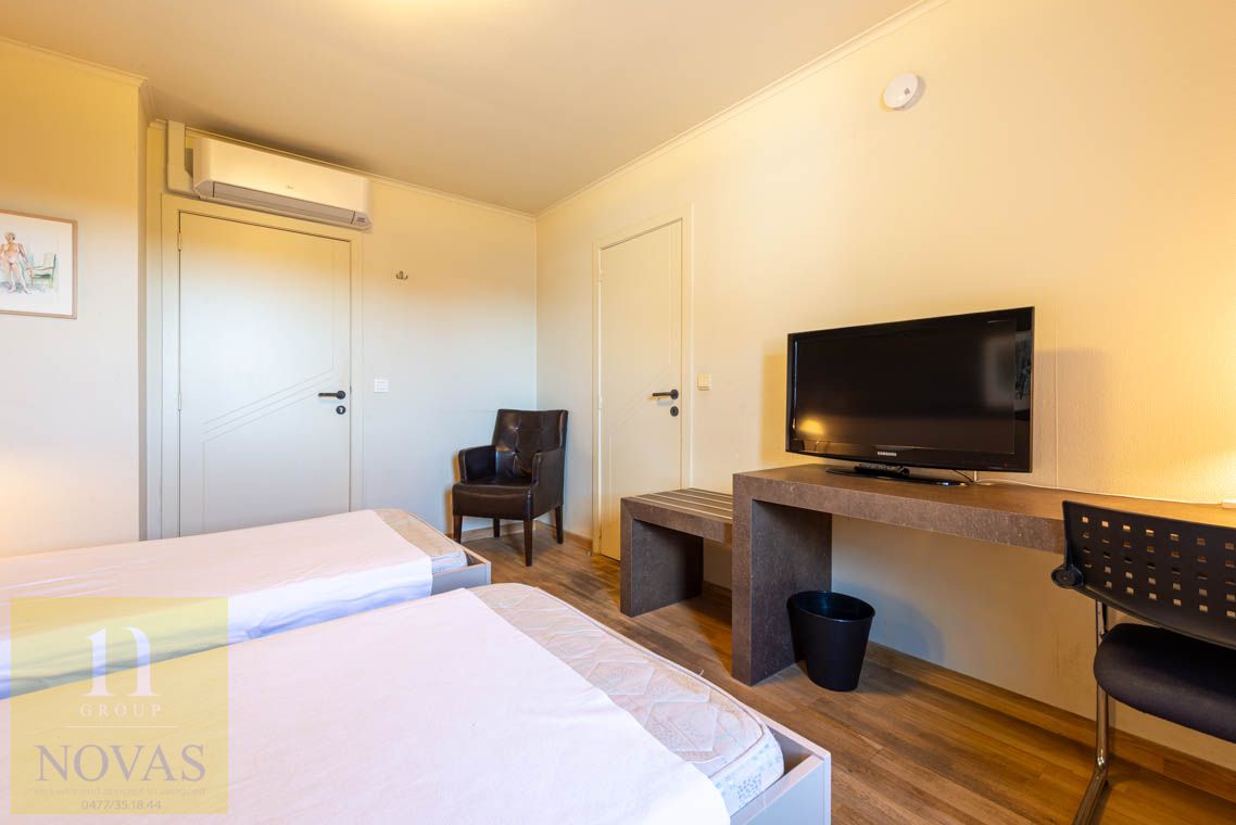 Authentiek handelspand / hotel met restaurant, feestzaal en mooie tuin op ideale locatie. foto 20