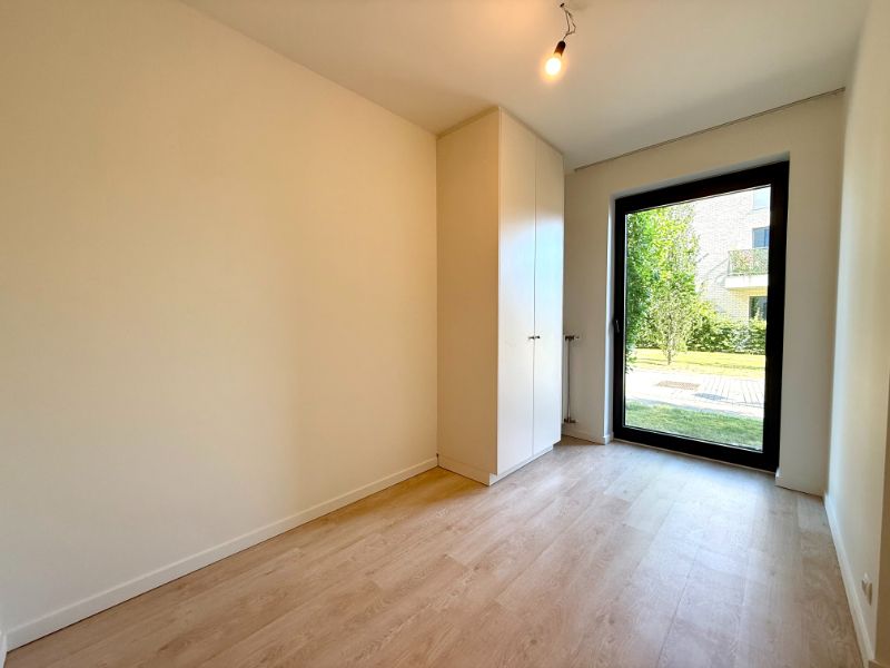 Centraal gelegen, gelijkvloers appartement met 2 slaapkamers en ruim terras met zicht op de Leie foto 15